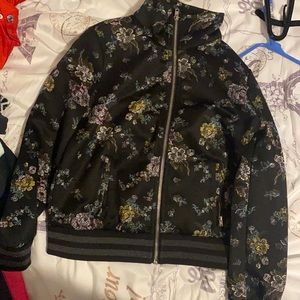 Jacket with flowers on it .